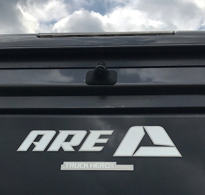 A.R.E. Walk-In Door Truck Cap